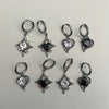 Black sparkle heart hoop earrings