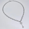 Double pearl and steel cross drop necklace